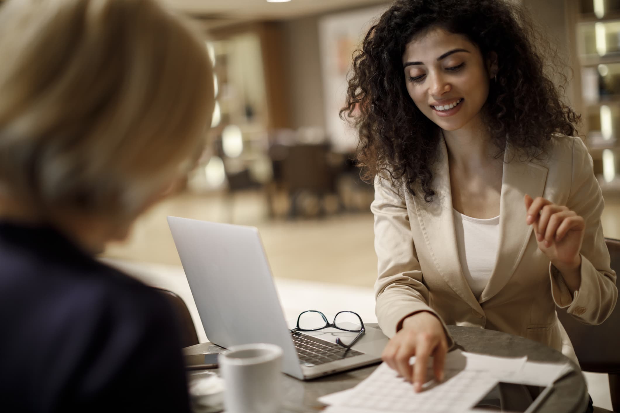 a business woman helping prepare tax paperwork