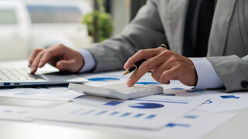 Zoom of accountant going over stats