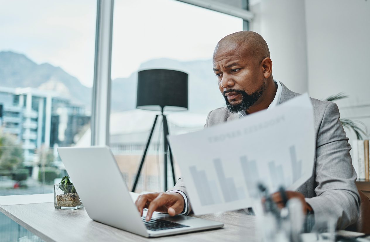 man looking through important documents